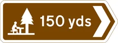 Direction and distance to picnic area — UK road sign