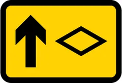 Direction of temporary diversion route from junction ahead — UK road sign