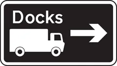 Junction ahead leading to a destination advised for goods vehicles — UK road sign