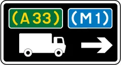 Junction ahead leading to route advised for goods vehicles — UK road sign