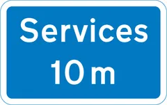 Example of UK motorway signs: 10 miles to the next motorway service area