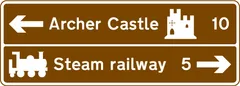 Junction ahead from a motorway exit slip road to the tourist attractions shown — UK road sign