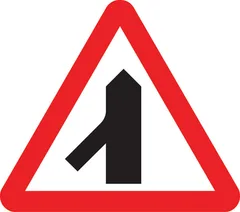 Traffic merges ahead from the left — UK road sign