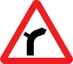 Junction on right bend ahead — UK road sign