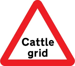 Cattle grid ahead — UK road sign