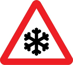 Risk of ice or packed snow ahead — UK road sign