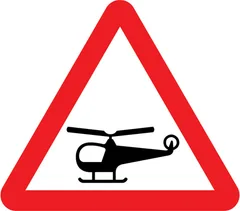 Low flying helicopters or sudden helicopter noise likely ahead — UK road sign
