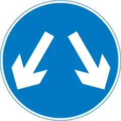 Vehicular traffic may reach the same destination by passing either side of the sign — UK road sign