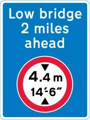 Advance warning of a mandatory height restriction ahead — UK road sign