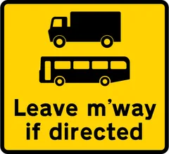 Goods vehicles and buses may be directed to leave the motorway at the junction ahead — UK road sign