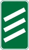 300 yards to a roundabout or the next point at which traffic may leave a non-primary route — UK road sign