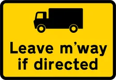 Goods vehicles may be directed to leave the motorway at the junction ahead — UK road sign