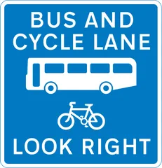 Contra-flow bus lane which pedal cycles may also use with traffic approaching from the right (reminder for pedestrians) — UK road sign
