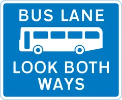 Bus lane with traffic proceeding from both ways (reminder for pedestrians) — UK road sign